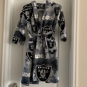 Handmade fleece Raiders bathrobe. Size is approx. youth 8-10. Great condition.